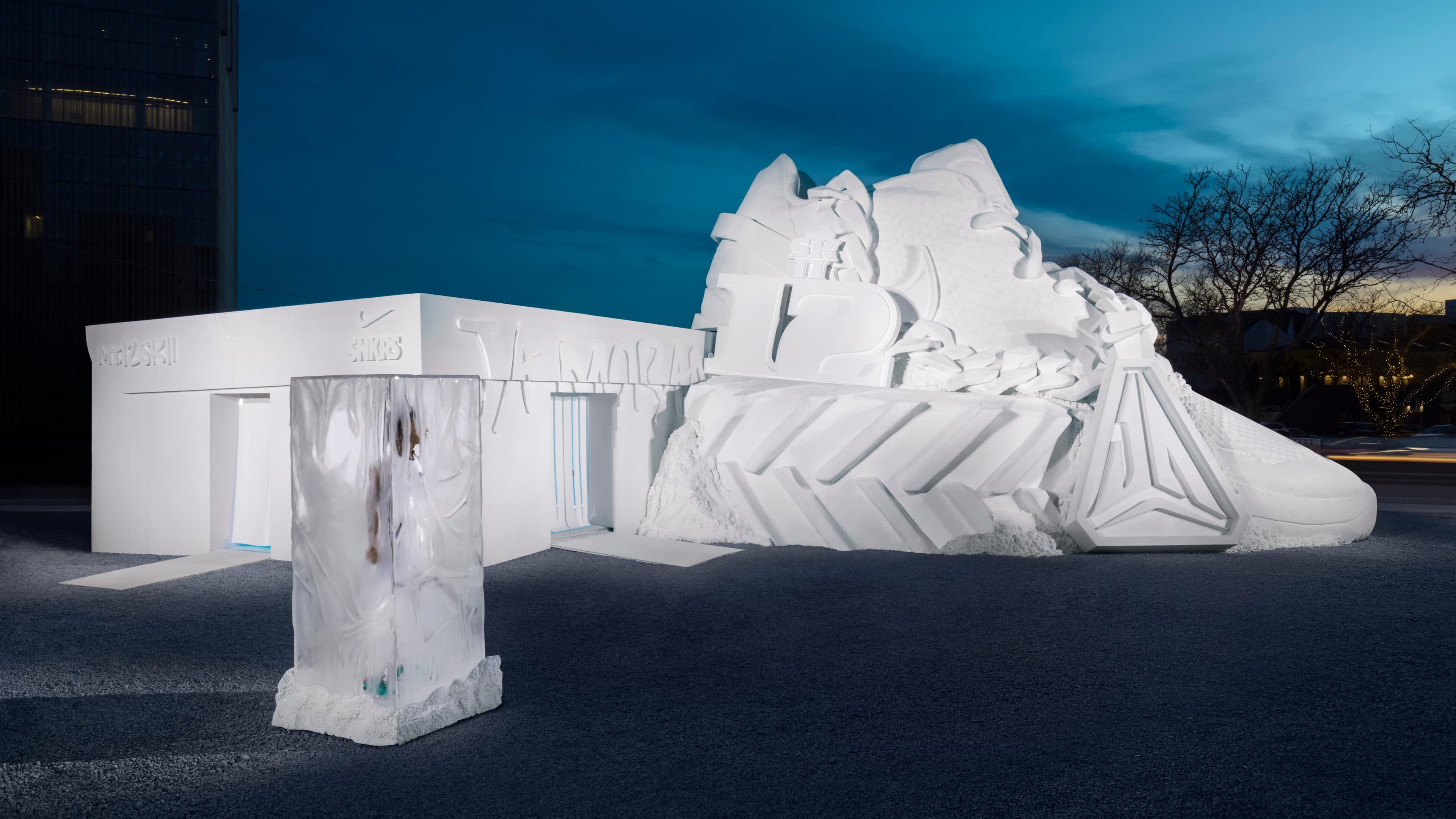 3D render of the snow sculpture and a clear ice box at dusk