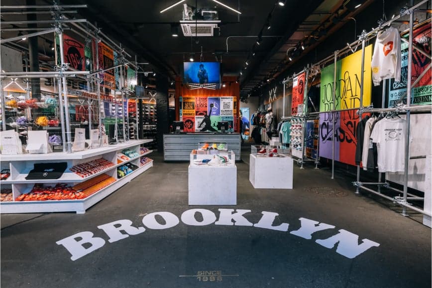 The Brooklyn pop-up shop, with racks of apparel and shelves of shoes and “Brooklyn” painted on the floor