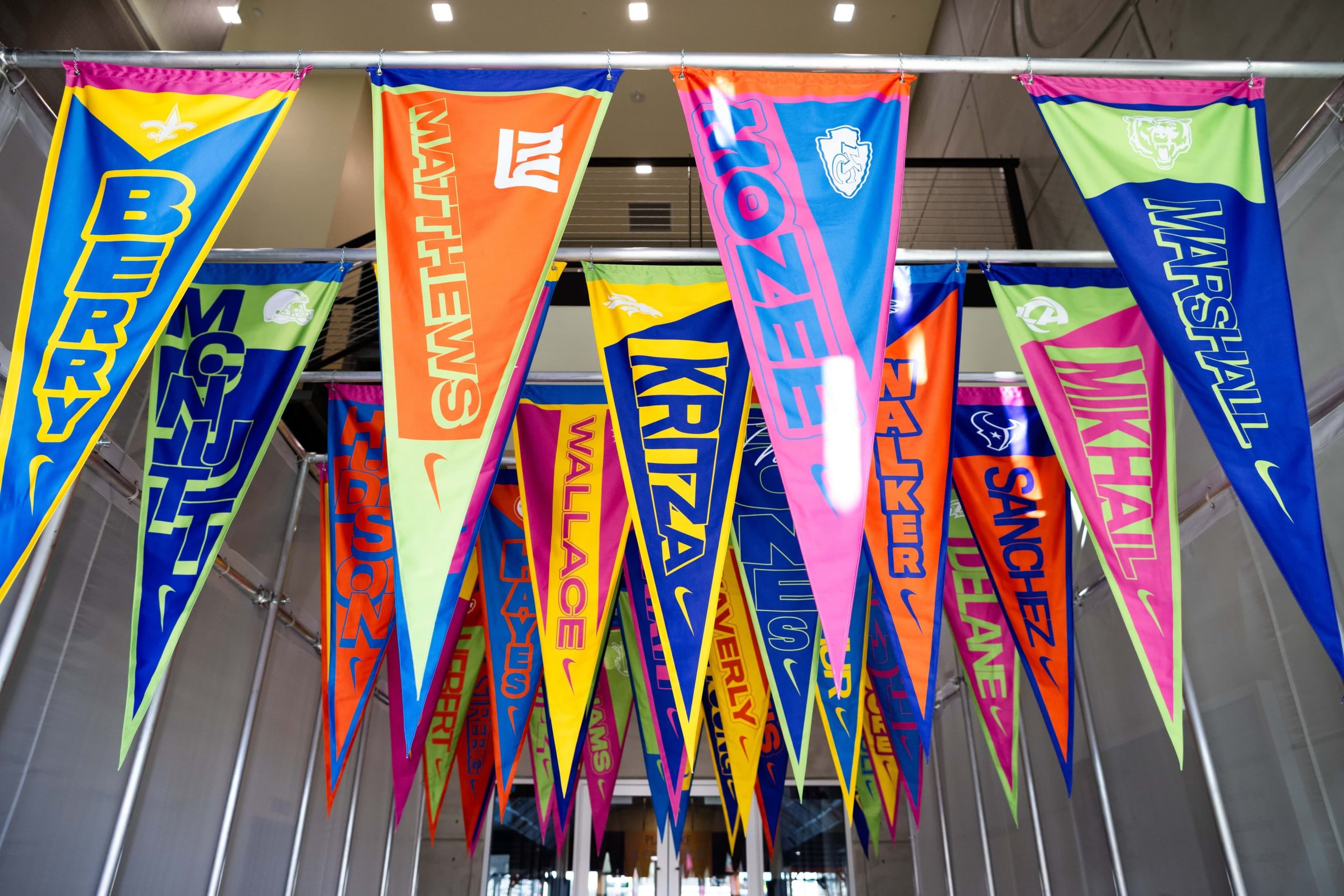 Colorful pennants printed with players’ names hanging from the ceiling