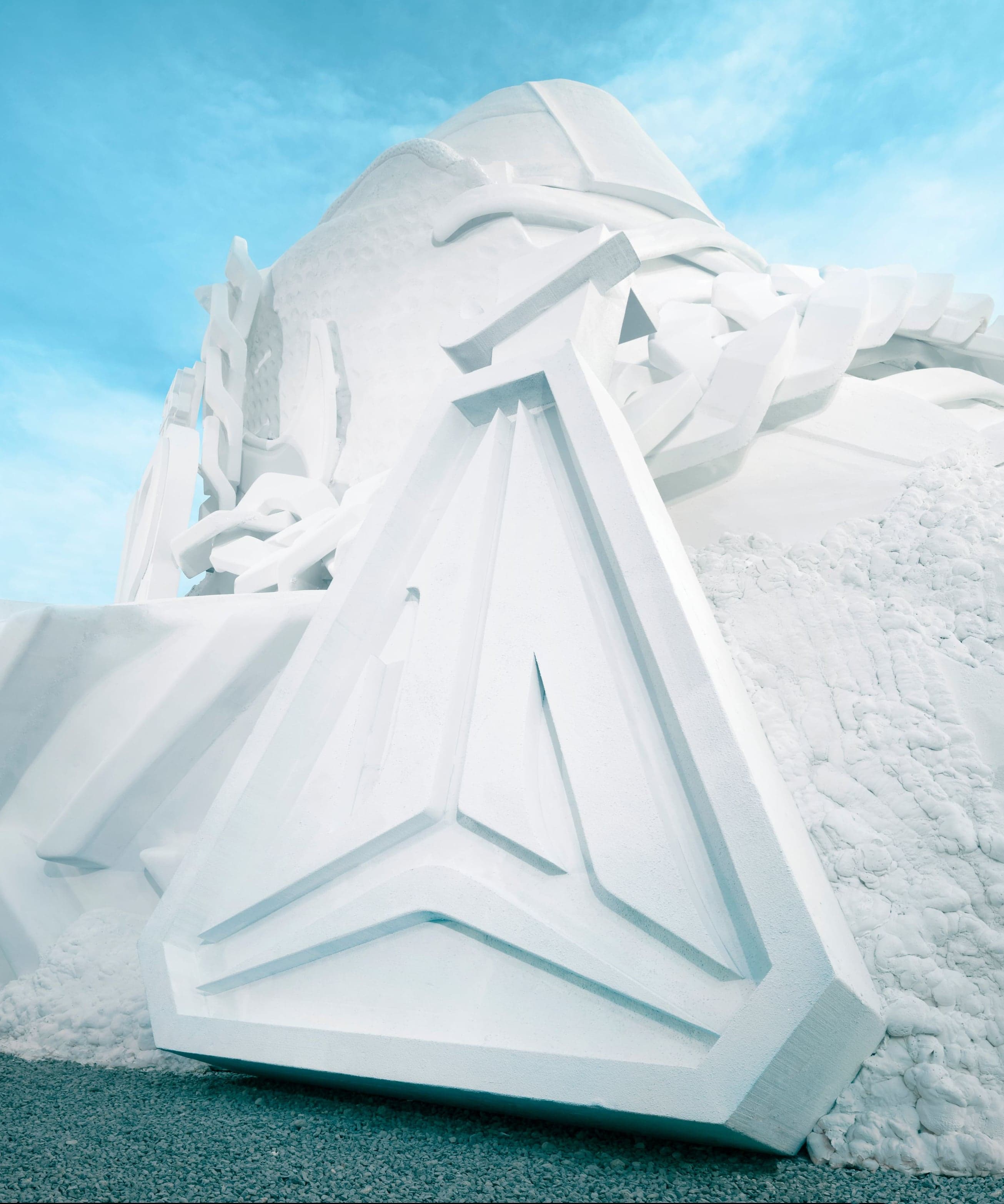The Ja logo carved into the side of the snow sculpture