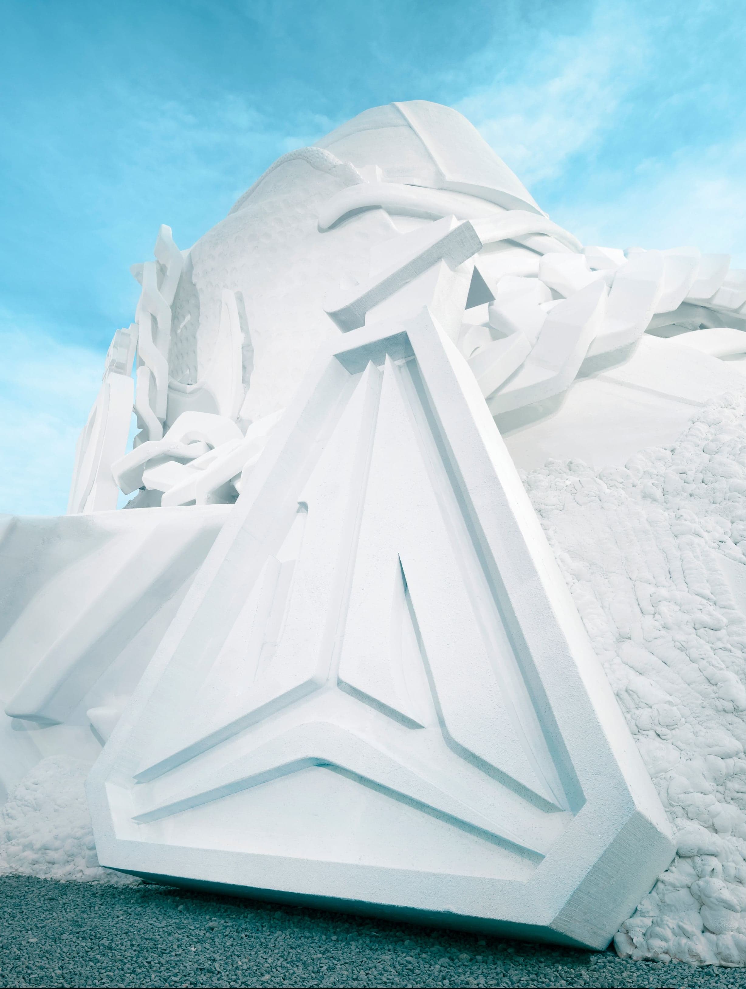 The Ja logo carved into the side of the snow sculpture