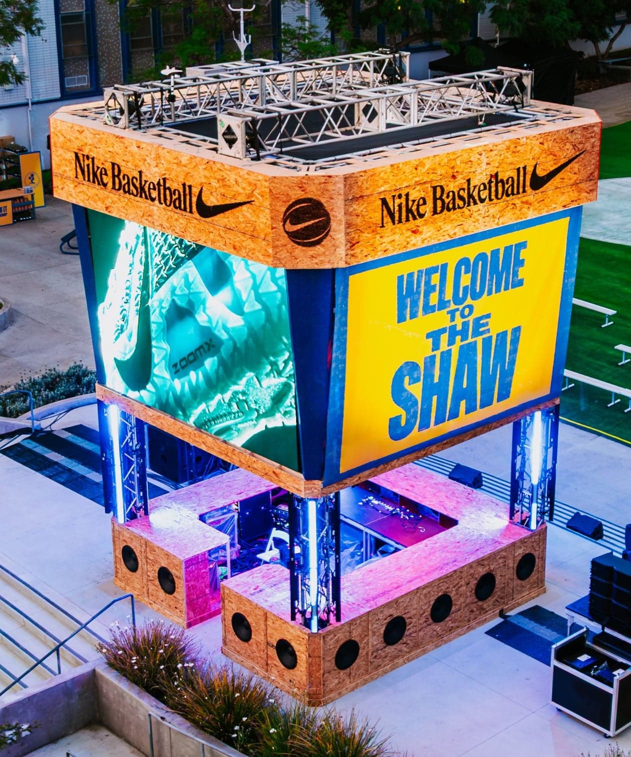 The “Welcome to The Shaw” tower above the school courtyard and stage
