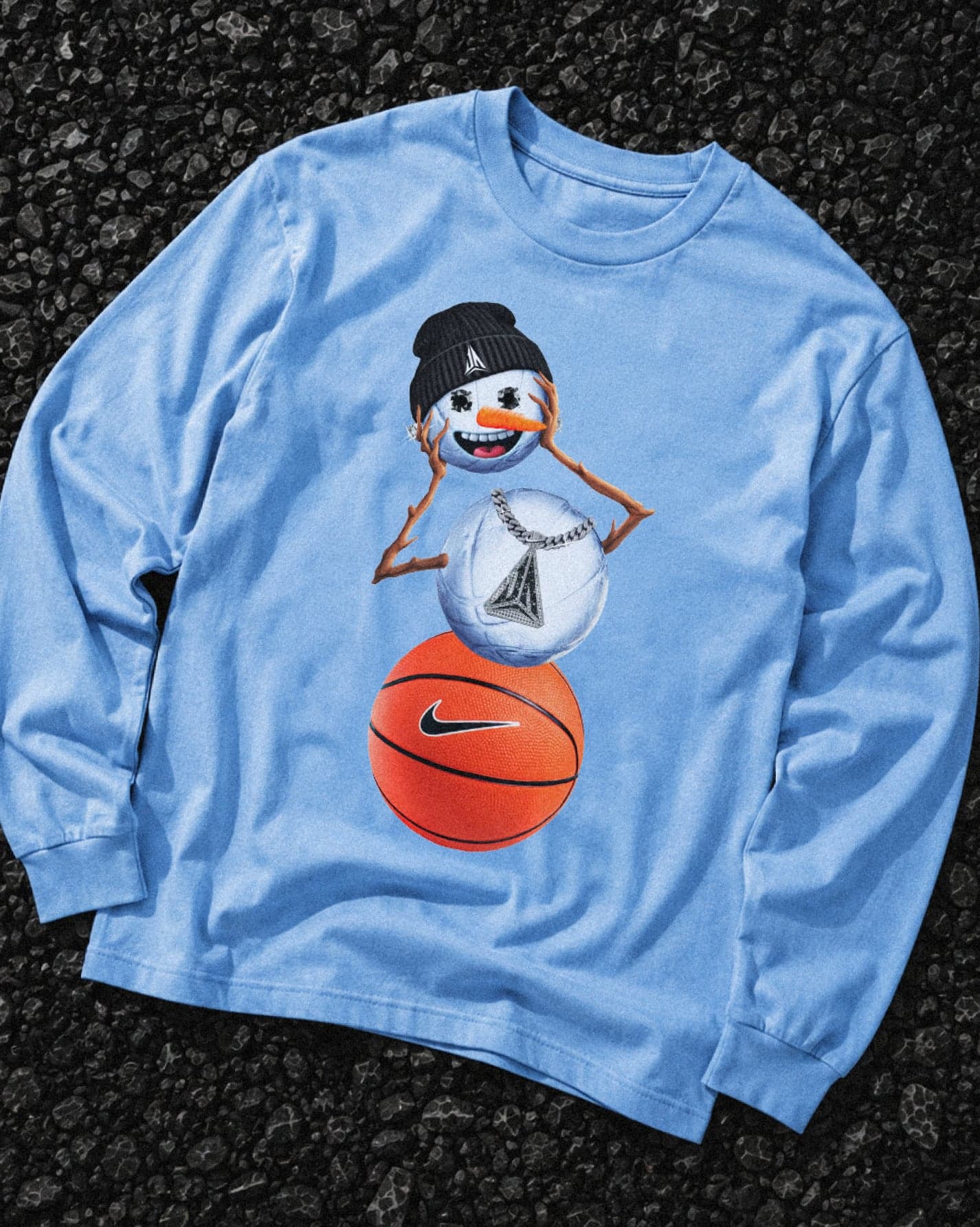 A blue long-sleeve tee printed with the snowman graphic