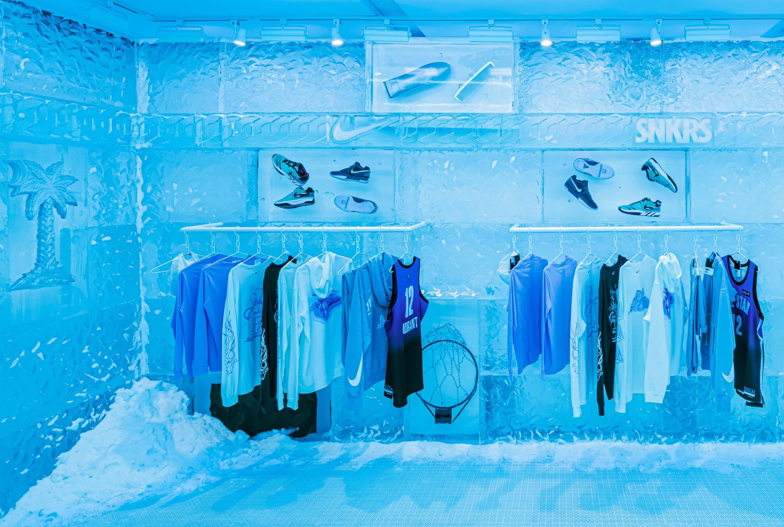 The ice store with clothing racks under bright strip lights
