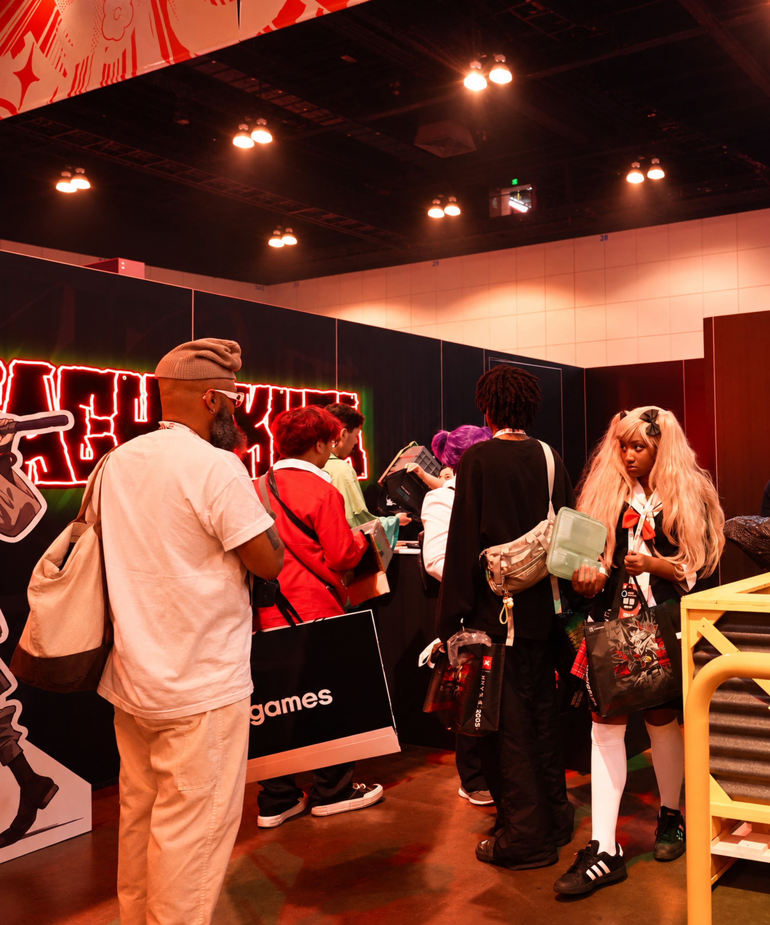 Fans in cosplay gathered around the Gachiakuta pit