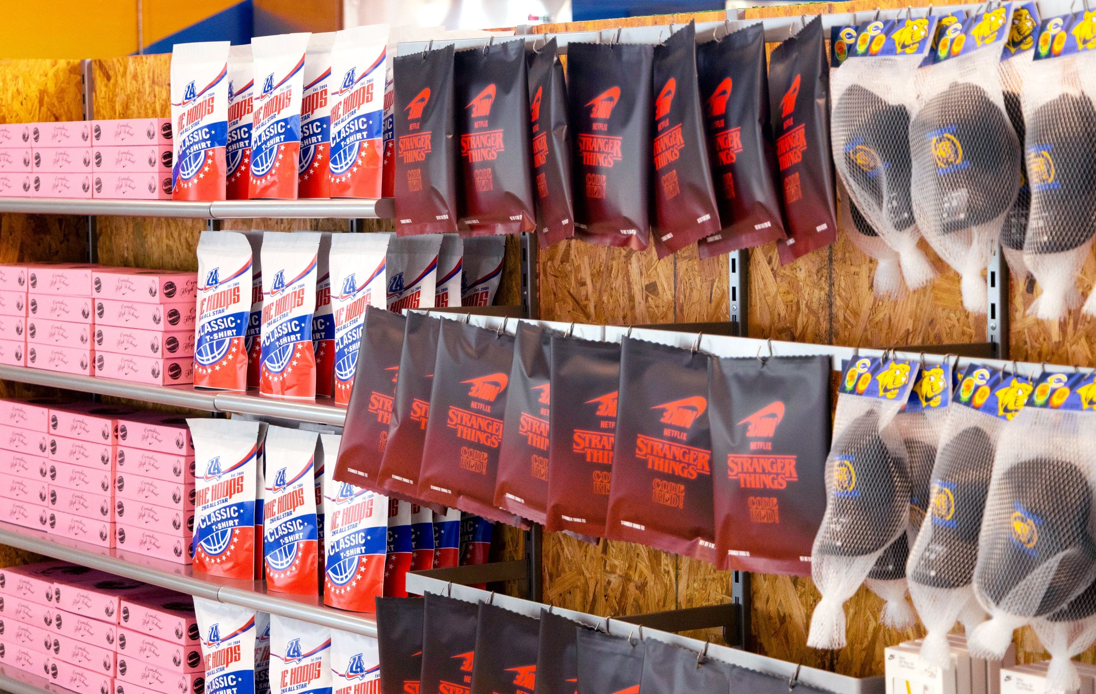 Grocery-style shelves stocked with Nike-branded snack boxes and products