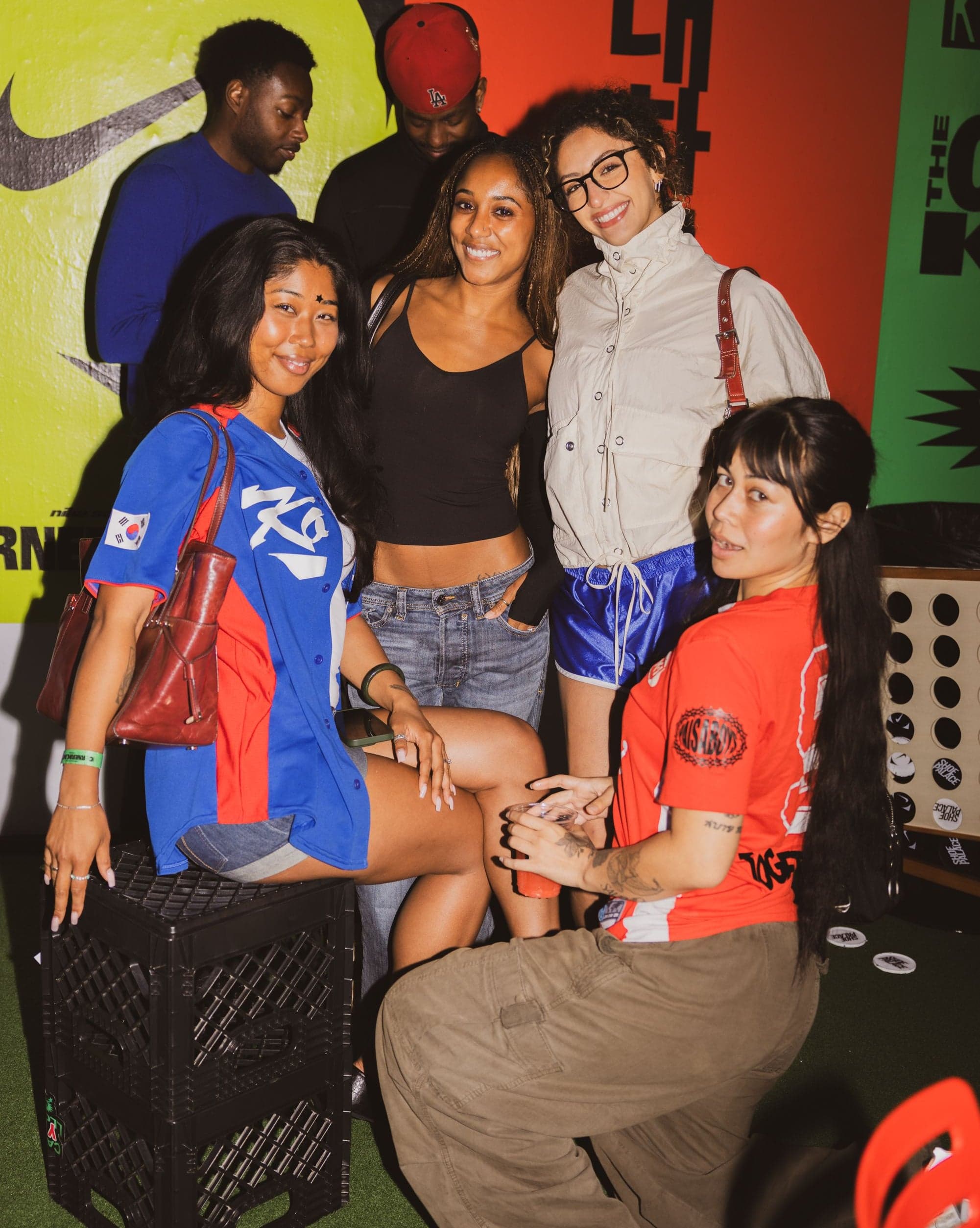 A group of guests in soccer jerseys posing together
