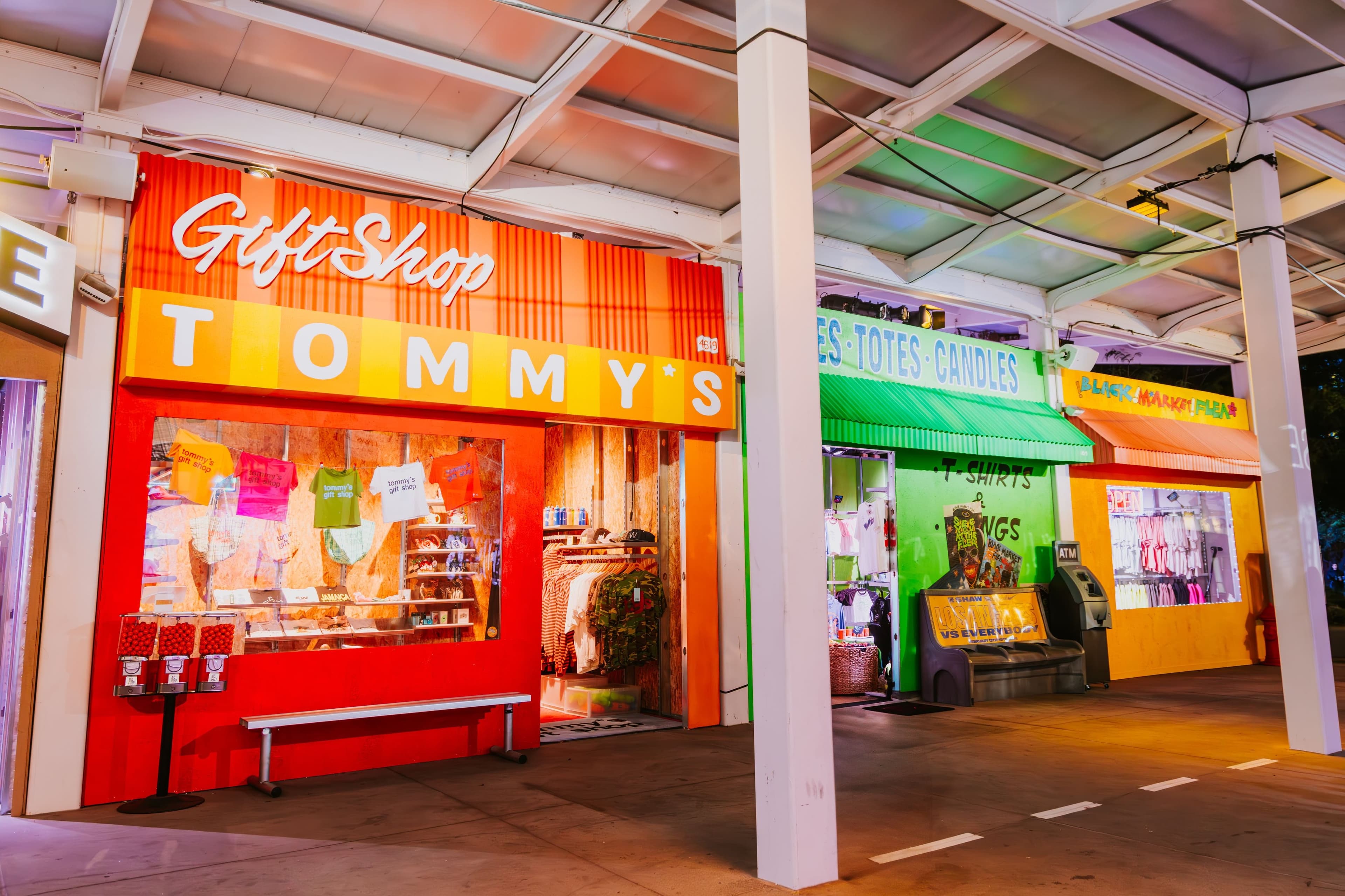 Tommy’s gift shop and neighboring storefronts in the 11th Ave night market