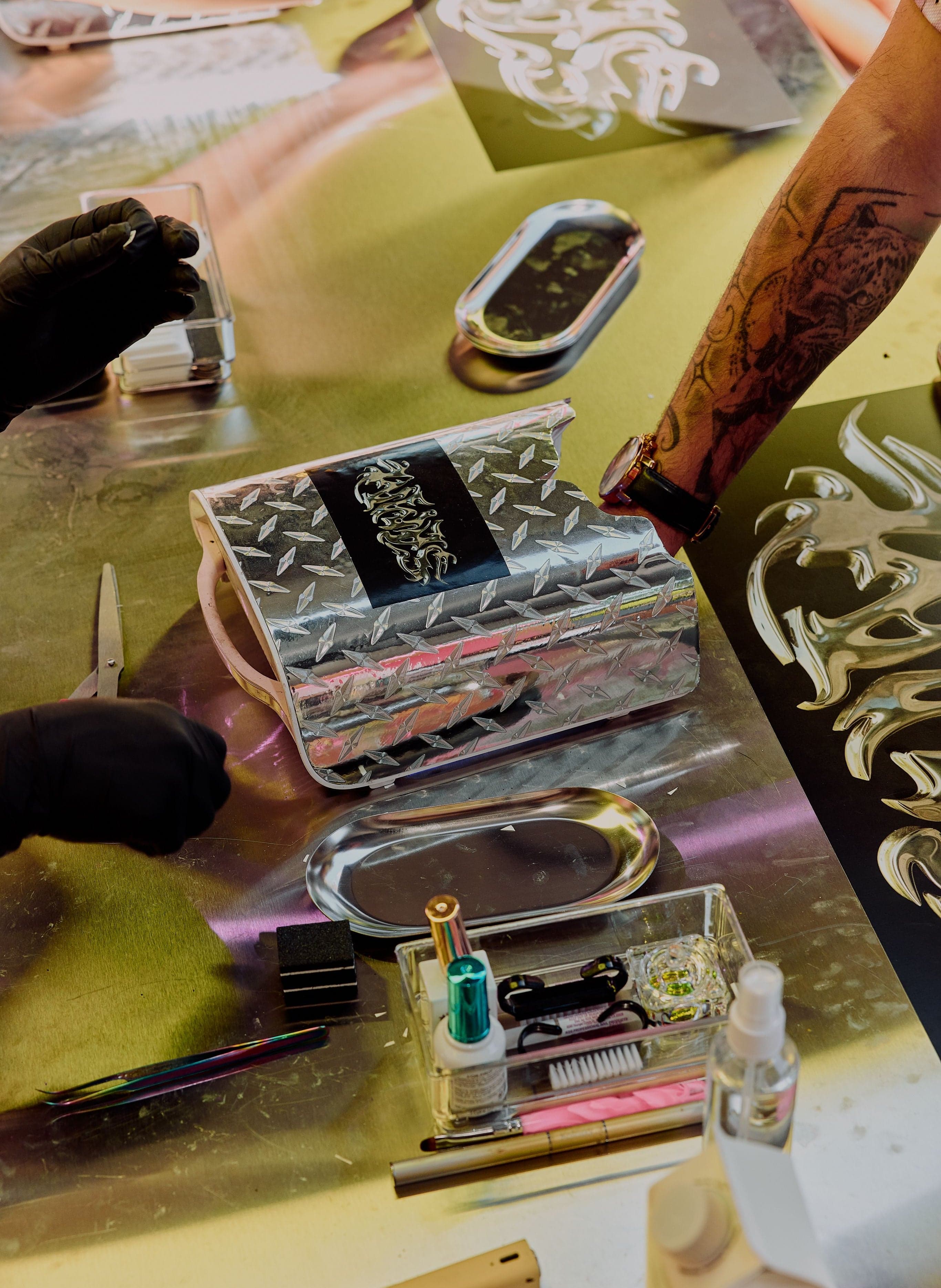 Tools and charms laid out at the customization workshop