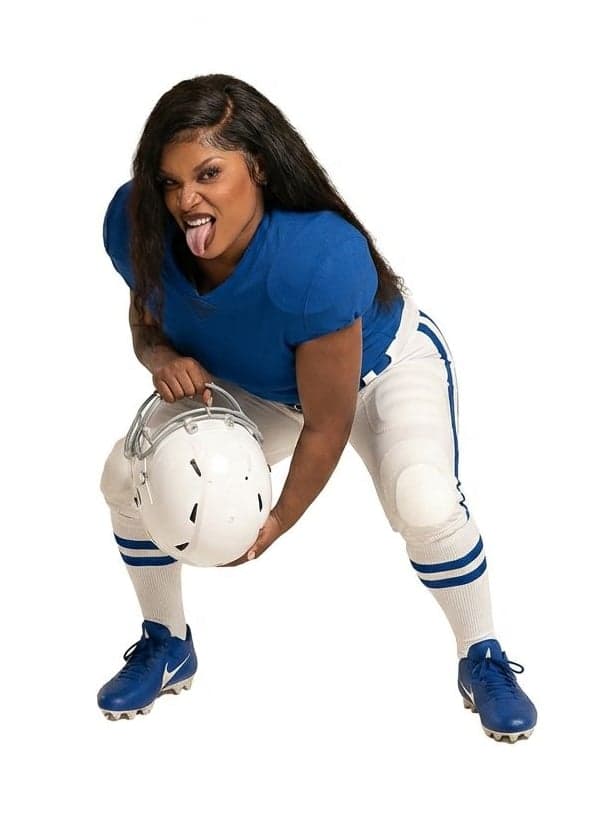 The same guest cut out on white, in a blue jersey and football pants, holding the helmet
